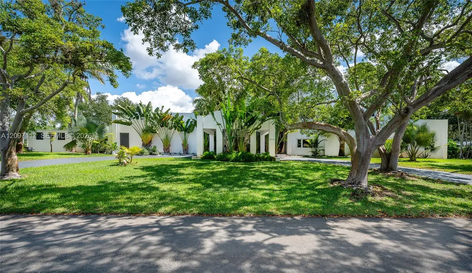 6 bedroom 6 bath Residential for sale at 9715 SW 89th Ct, Miami FL 33176